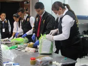 LIMA - Packages being opened.