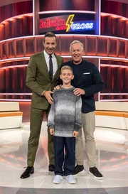 Kai Pflaume (l.), Nick (10) und Johannes B. Kerner