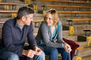 George Clooney (Ryan Bingham), Vera Farmiga (Alex Goran).