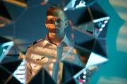 RE-CREATION: Lubitz (played by T.J. Riley) now dressed, looks in mirror.