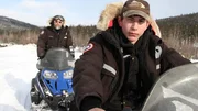 Parker Schnabel and Tony snowmobile.