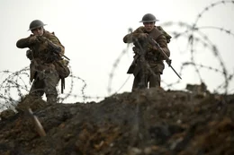 L-R: Lance Corporal Blake (Dean-Charles Chapman), Lance Corporal William Schofield (George MacKay).