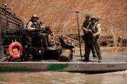Laredo, TX: Customs and Border Protection officers patrolling the water for drug runners crossing the border.