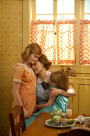 Morgan Turner as Veda Pierce and Kate Winslet as Mildred Pierce