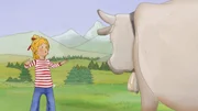 Conni erschrickt vor der Kuh, die pl&ouml;tzlich im Weg steht.