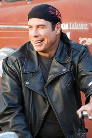 Vom perfekten Spie&szlig;er, zum M&ouml;chtegern Biker: Woody (John Travolta) ...