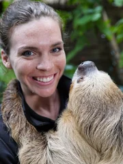 How do sloths live upside down? A toe-toed sloth from Cincinnati Zoo called Mo with zookeeper Maura Messerly