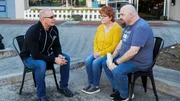 Chef Robert Irvine talks with Jessica Webb, owner of Grumpy's Diner, and Justin, son of Jessica/cook at the restaurant, outside of Grumpy's Diner in Madison, FL.