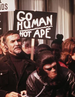 C&auml;sar (Roddy Mcdowall, r.)