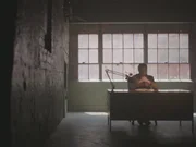 Howard Elkins sits at his desk. Howard Elkins sits at his desk.