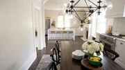 The new open concept kitchen and dinning room in Greg and Kellys traditional victorian home as seen on Restored by the Fords Dinning room after 2