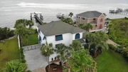 Aerial of the front and sides of the Point House, complete with its own dock for boat storage. As seen on HGTV's Beach Hunters. Aerial of the front and sides of the Point House, complete with its own dock for boat storage. As seen on HGTV's Beach Hunters.