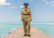 Commissioner Selwyn Patterson (Don Warrington) Commissioner Selwyn Patterson (Don Warrington)