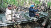 Dave Canterbury and Cody Lundin paddling down river in Louisiana. Dave Canterbury and Cody Lundin paddling down river in Louisiana.