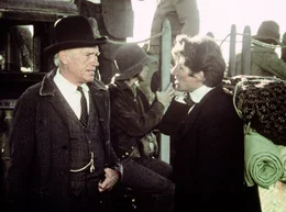 Der Vormann (Robert Wilke, links) sucht Erntehelfer. Bill (Richard Gere) meldet sich.