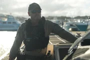 Ein CBP-Agent steht auf einem Wasserfahrzeug mit dem Meer im Rücken in Mayaguez, P.R. (Lucky 8 TV/Paul Taggart)
