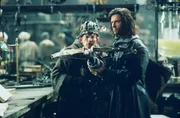 L-R: Carl (David Wenham), Van Helsing (Hugh Jackman)