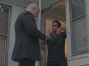 Det. Cory Clarke asking suspect Jose a few questions outside his door. Det. Cory Clarke asking suspect Jose a few questions outside his door.