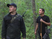 Bob Wright (L) and Joey Zuray (R) both scan the forest for grouse.