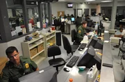 Nogales, Arizona, USA: Border Patrol headquarters where agents watch surveillance cameras from headquarters to monitor the border of Nogales.