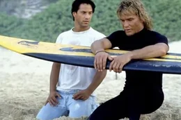 Keanu Reeves as Johnny Utah and Patrick Swayze as Bodhi.