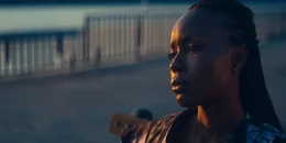 Aisha (Anna Diop)