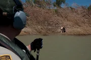 Laredo, TX: Customs and Border Protection agents patrolling the Rio Grande and looking for runners that my be attempting to enter the country illegally. Laredo, TX: Customs and Border Protection agents patrolling the Rio Grande and looking for runners that my be attempting to enter the country illegally.