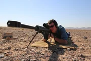 Sean shoots a rifle in the desert – the bullet is the inspiration behind designing a plane so aerodynamic that it travels faster than the speed of sound.