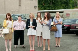 (l-r) Becca (Ellie Kemper), Megan (Melissa McCarthy), Annie Walker (Kristen Wiig), Helen (Rose Byrne), Lillian (Maya Rudolph), Rita (Wendi McLendon-Covey)