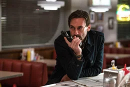 Buddy (JON HAMM) waits for Baby in the diner in TriStar Pictures' BABY DRIVER.