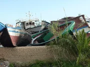 Überreste der Flüchtlingsboote auf dem ‚Schiffsfriedhof‘ von Lampedusa.