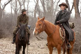 Mattie Ross (Hailee Steinfeld), Marshal Rooster Cogburn (Jeff Bridges)