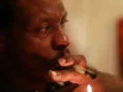 A user smoking a crack pipe. A user smoking a crack pipe.