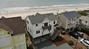Aerial of the front of the Industrial House, with convenient beach access right behind the house. As seen on HGTV's Beach Hunters. Aerial of the front of the Industrial House, with convenient beach access right behind the house. As seen on HGTV's Beach Hunters.