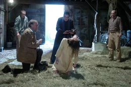 Center - Tom Wilkinson (Father Moore) with Jennifer Carpenter (Emily Rose)