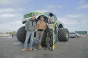 Tim, Fuzz and Tony pose in front of Tony's monster truck.