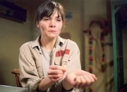 Eine Frau boxt sich durch