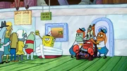 SpongeBob (4.v.r.), Mr. Krabs (2.v.r.)