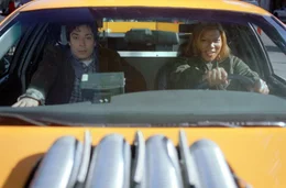 L-R: Detective Andy Washburn (Jimmy Fallon), Isabelle "Belle" Williams (Queen Latifah).