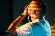 RE-CREATION: Lubitz (played by T.J. Riley) takes his pills.