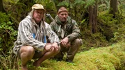 USA, Washington, Olympic National Forest, Cody Lundin and Dave Canterbury walking through Pacific Northwest rainforest during Dual Survivor filming USA, Washington, Olympic National Forest, Cody Lundin and Dave Canterbury walking through Pacific Northwest rainforest during Dual Survivor filming