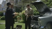 FBI agents question Jack Graham outside his home. FBI agents question Jack Graham outside his home.