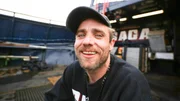Captain of the Saga Jake Anderson smiling at camera