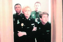 L-R: Jones (Michael Winslow), Callahan (Leslie Easterbrook), Tackleberry (David Graf)