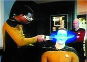 L-R: Lt.  Lt. Cmdr. Geordi La Forge (LeVar Burton), Commander Data (Brent Spiner)