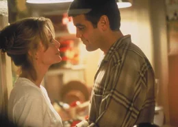 Melanie Parker (Michelle Pfeiffer, l.); Jack Taylor (George Clooney, r.)