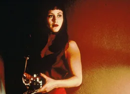 Patricia Arquette als Renee Madison.