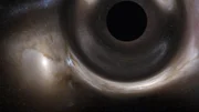 Schwarze Löcher verschlingen Materie und krümmen Raum und Zeit. Noch immer geben sie den Wissenschaftlern viele Rätsel auf. Schwarze Löcher verschlingen Materie und krümmen Raum und Zeit. Noch immer geben sie den Wissenschaftlern viele Rätsel auf.