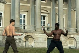 L-R: Conrad Oxford (Harris Dickinson), Shola (Djimon Hounsou)