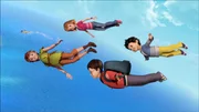 Peter Pan, Wendy, John und Michael sind zusammen mit TinkerBell auf dem Luftweg nach Nimmerland.